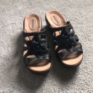 We never been worn Clark sandals